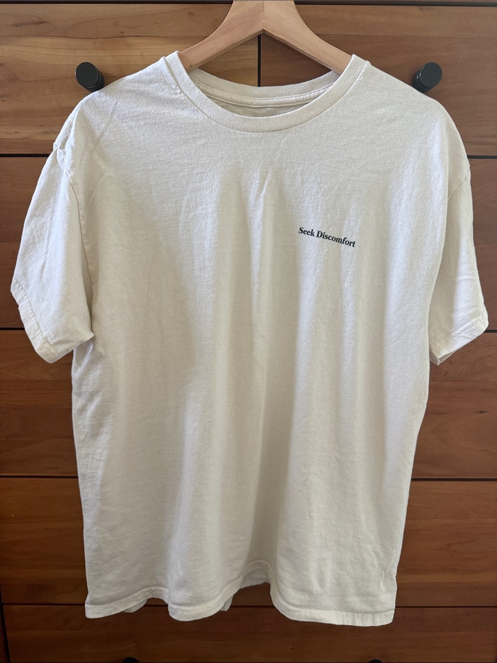 Seek Discomfort Crew Neck "Explore the Unknown" Graphic Tee in Off-White Size L